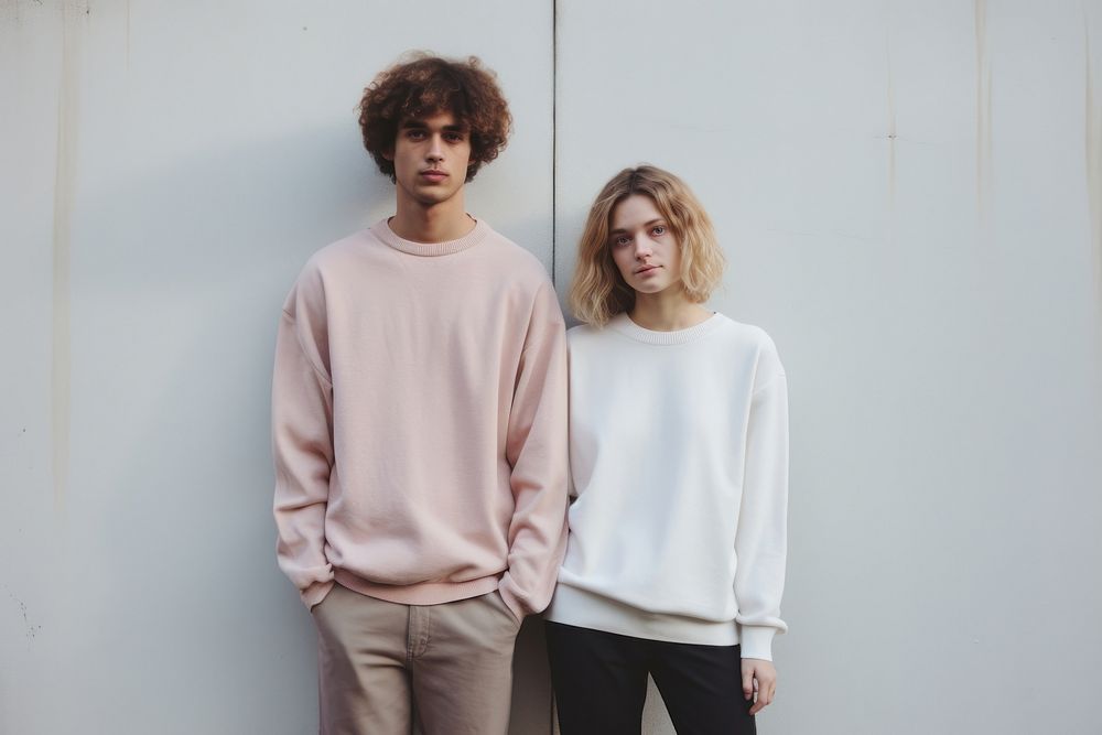 Man and women both with posing together sweatshirt sweater t-shirt. AI generated Image by rawpixel.