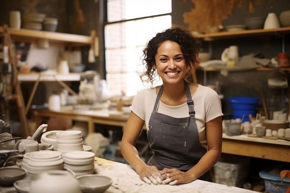 Mixed race smiling working ceramic. AI generated Image by rawpixel.