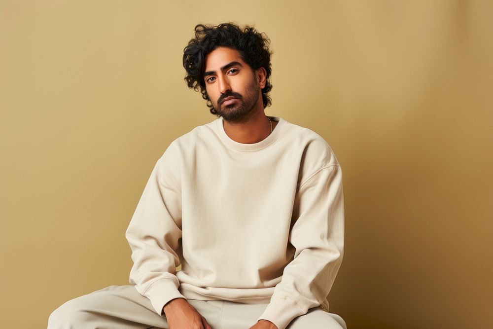 Streetwear portrait sitting adult. AI generated Image by rawpixel.