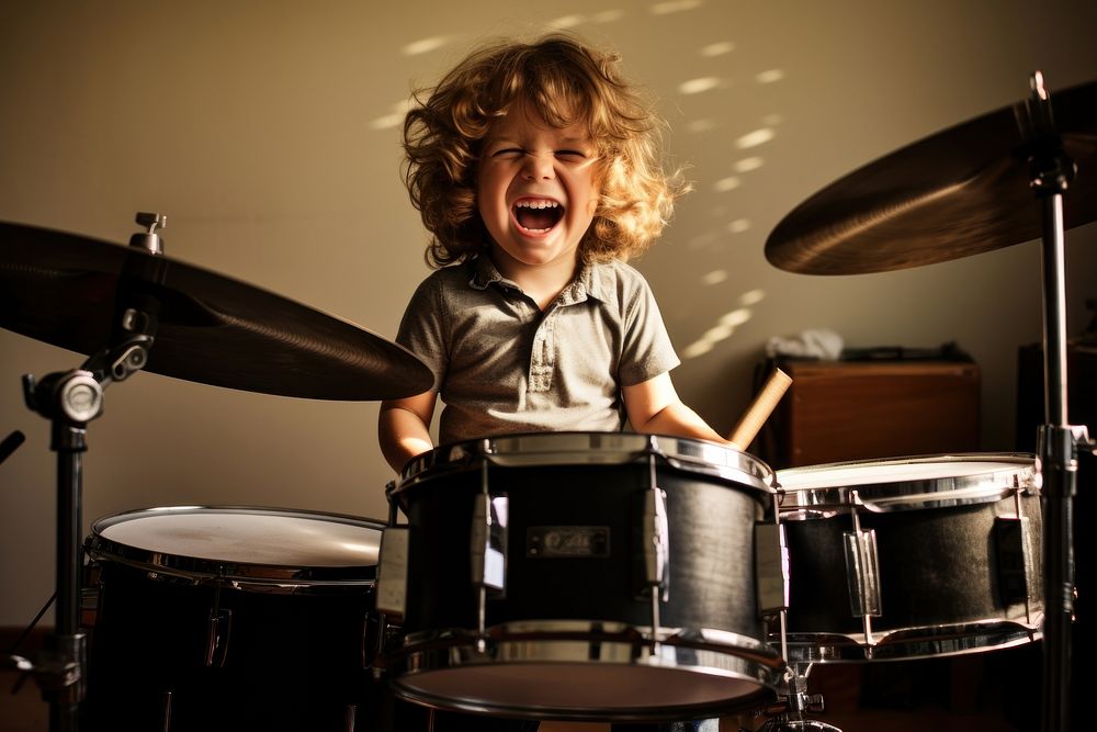 Chubby boy drums percussion musician. AI generated Image by rawpixel.