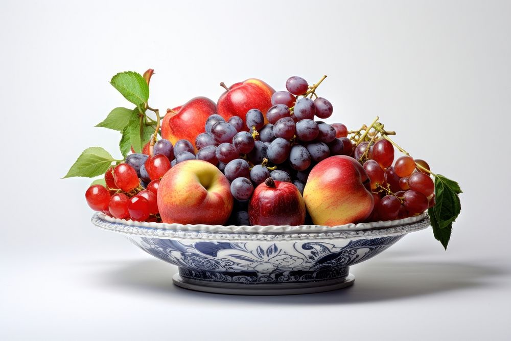 Fruit in a porcelain plate fruit grapes apple. AI generated Image by rawpixel.