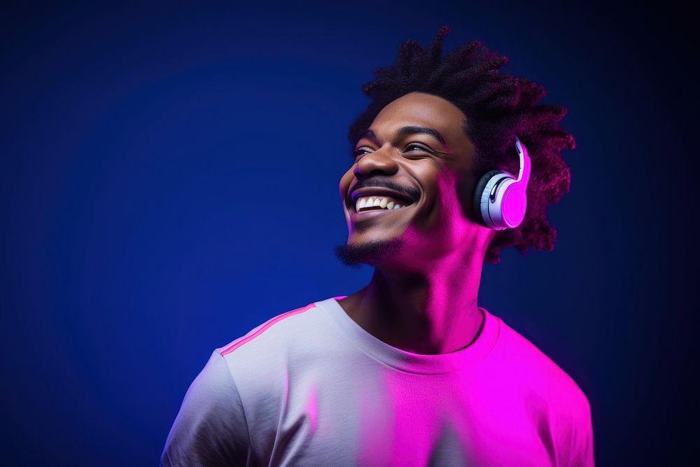 Happy young man headphones portrait headset. AI generated Image by rawpixel.