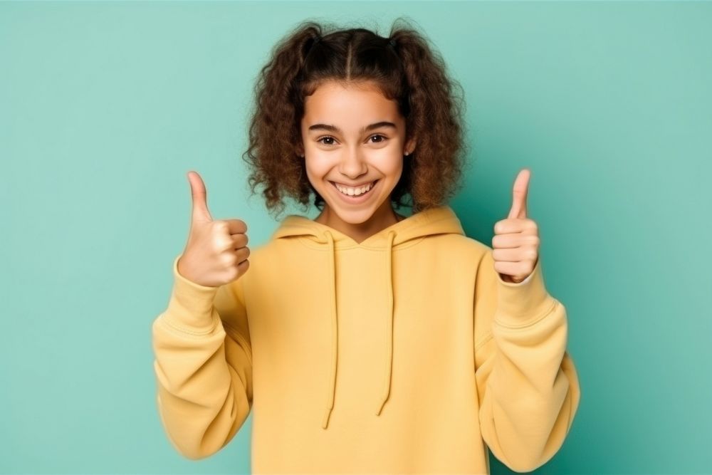 Woman show front screen mobile phone sweatshirt smile happy. AI generated Image by rawpixel.