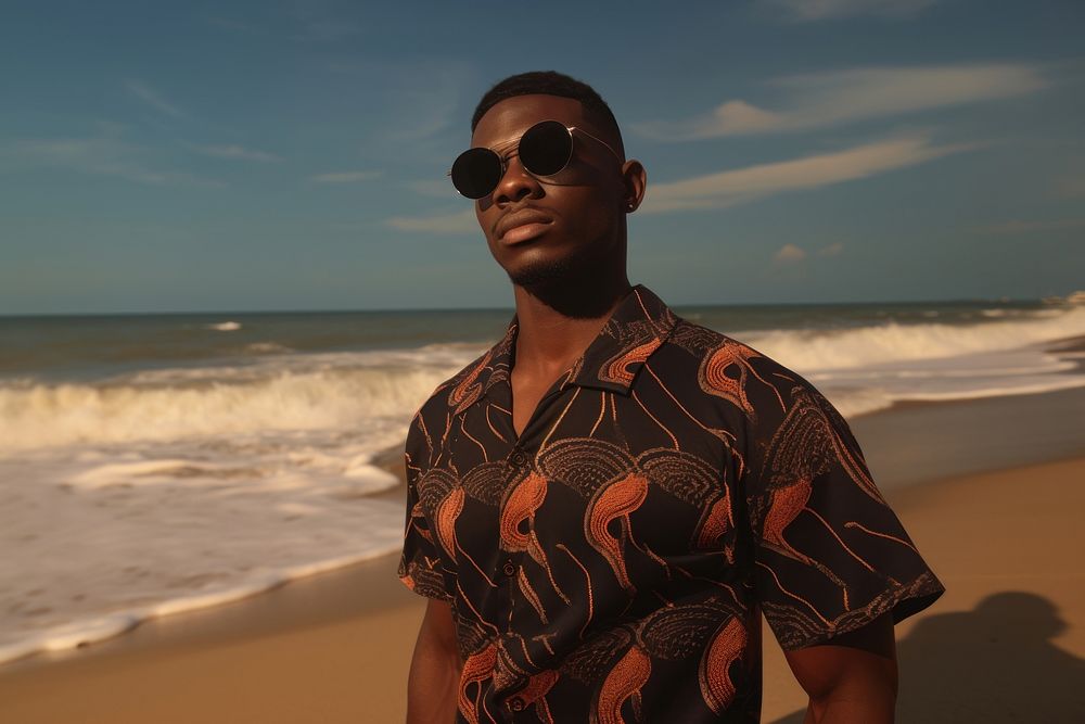 Black man beach sunglasses portrait. 