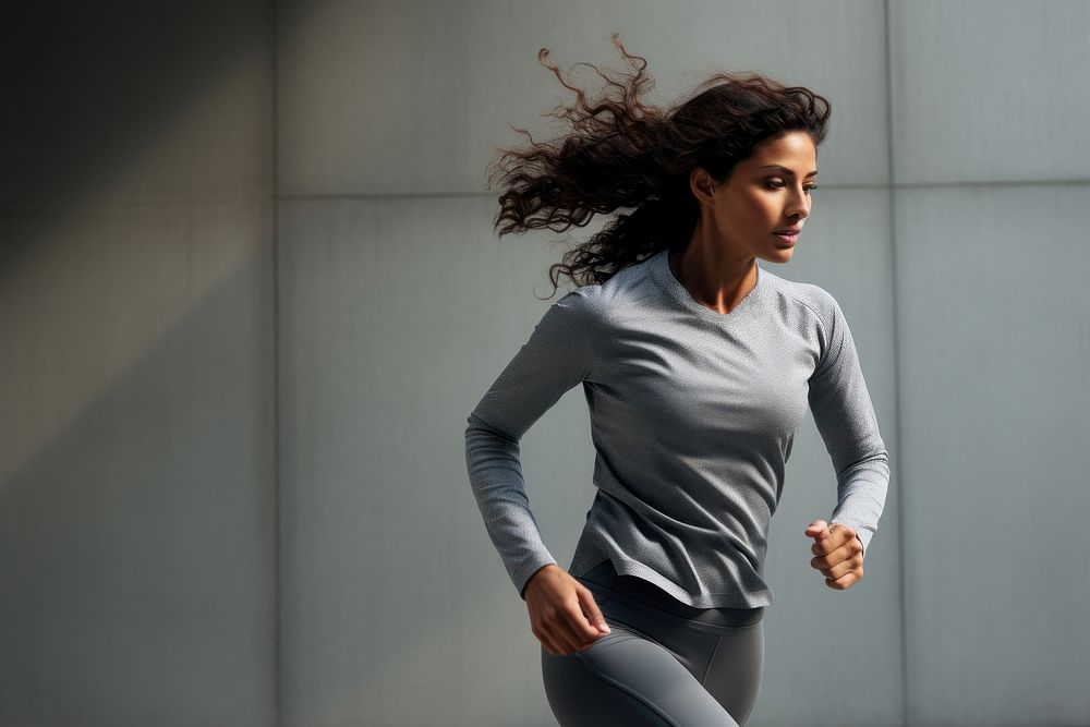 Woman running in sports outfit jogging adult determination. AI generated Image by rawpixel.