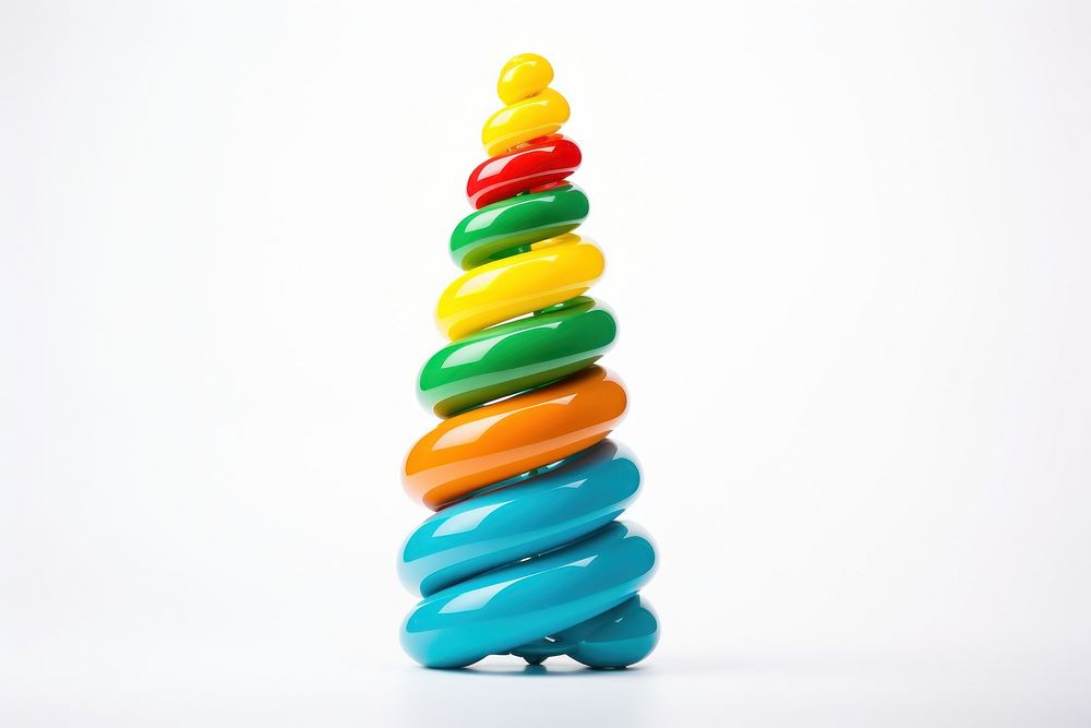 A balloon twisting in a shape pf christmas tree white background celebration accessories. AI generated Image by rawpixel.