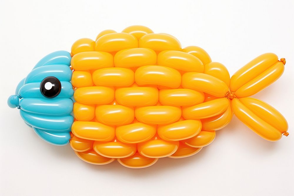A balloon twisting in the shape of a sea fish food toy white background. AI generated Image by rawpixel.