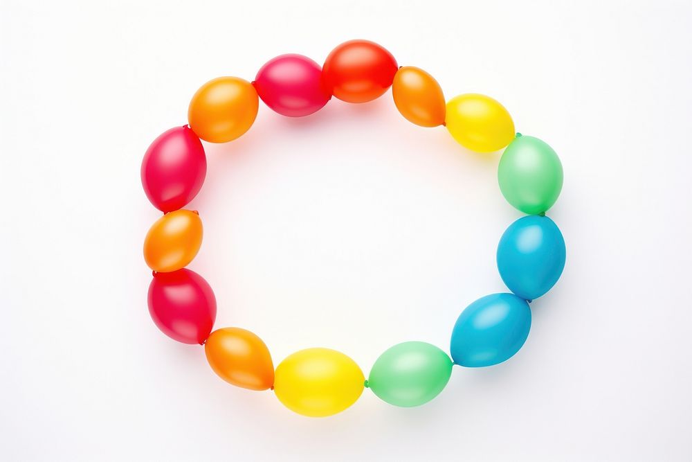 A balloon twisting in the shape of a simple circle shape bracelet jewelry white background. AI generated Image by rawpixel.