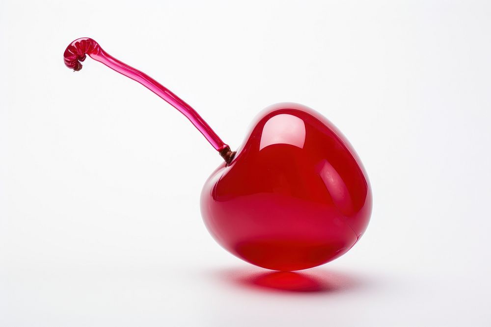 A balloon twisting in the shape of a cherry balloon white background produce heart. AI generated Image by rawpixel.