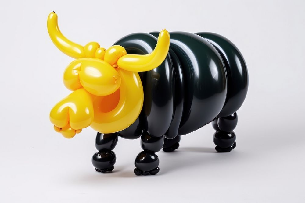 A balloon twisting in the shape of a buffalo figurine toy white background. AI generated Image by rawpixel.