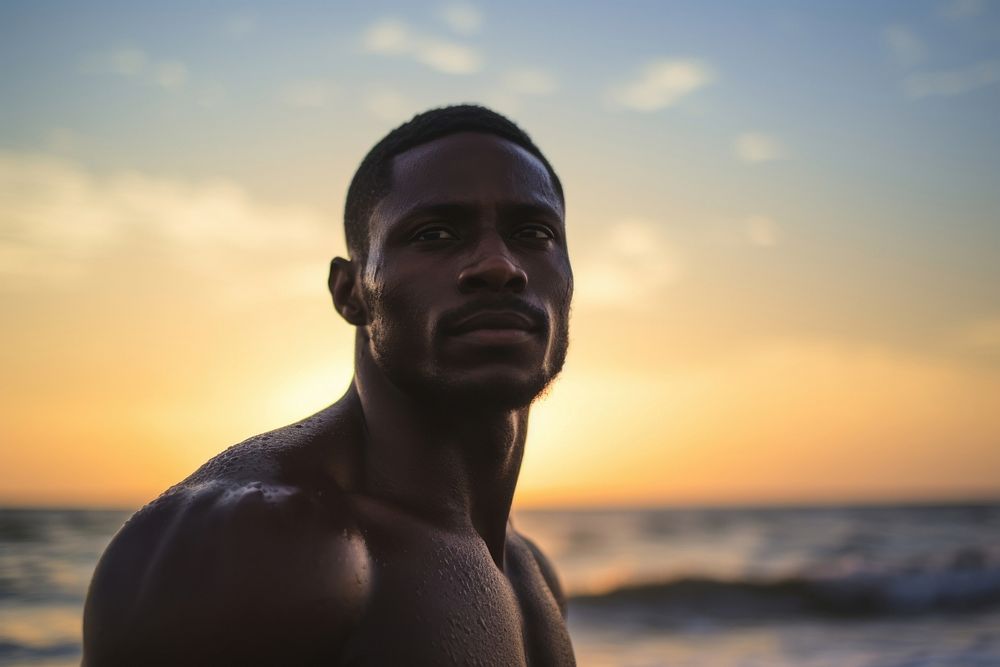 Black man portrait sunset beach. AI generated Image by rawpixel.