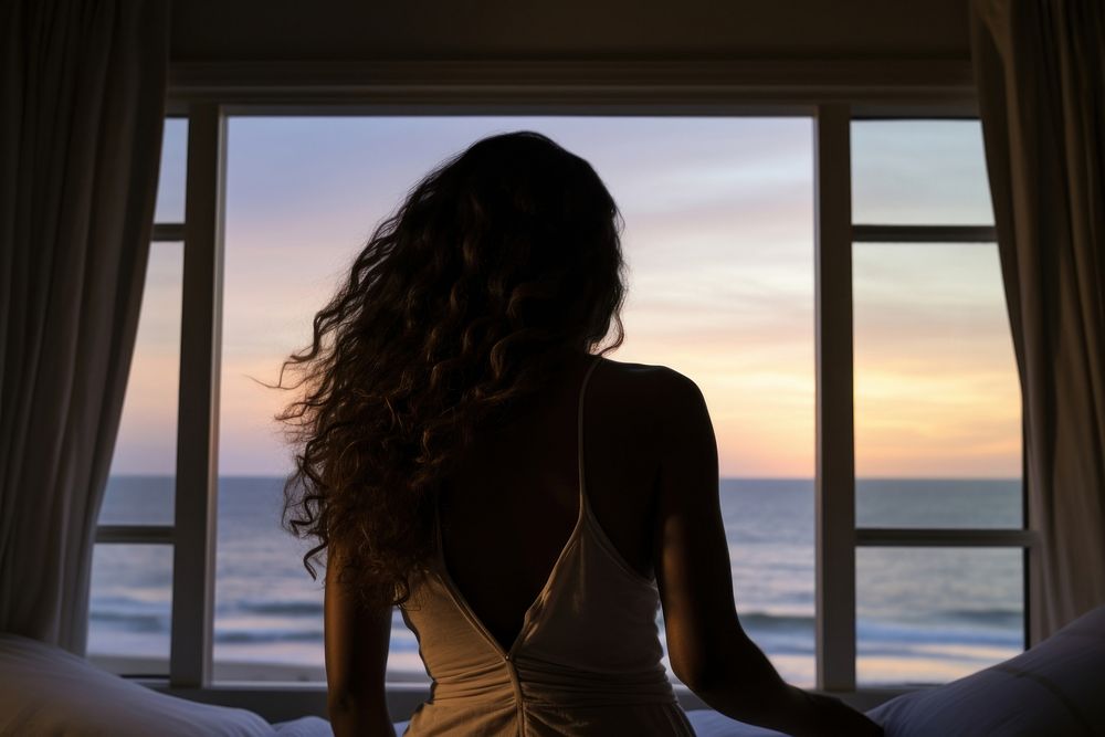 Woman wakes up window beach adult. AI generated Image by rawpixel.