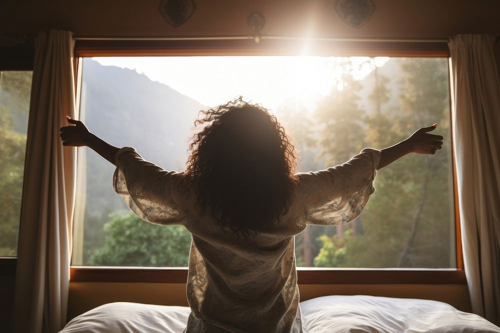 Woman wakes up window bedroom cozy. AI generated Image by rawpixel.