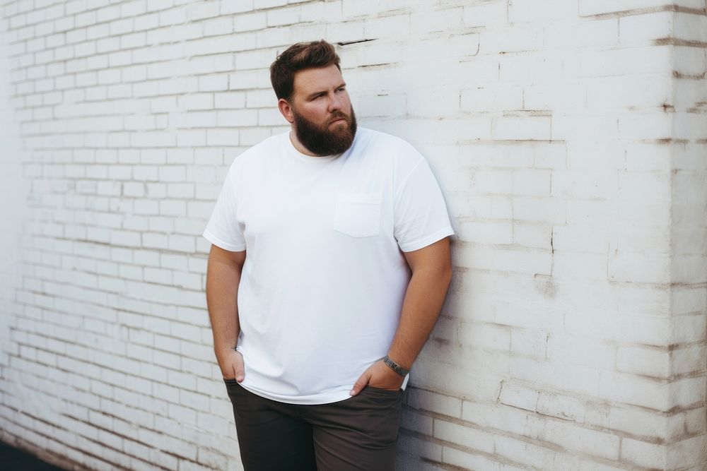 Man in a white t-shirt fashion sleeve beard. AI generated Image by rawpixel.
