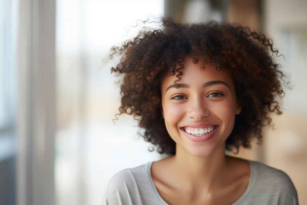 Young african american woman portrait smiling adult. AI generated Image by rawpixel.