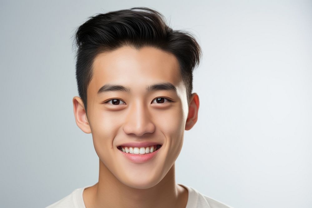 Young asian man portrait smiling adult. AI generated Image by rawpixel.