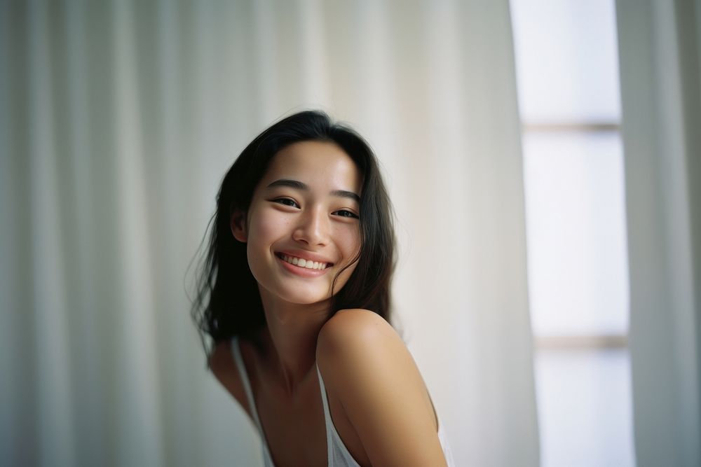 Young asian woman portrait smiling adult. AI generated Image by rawpixel.