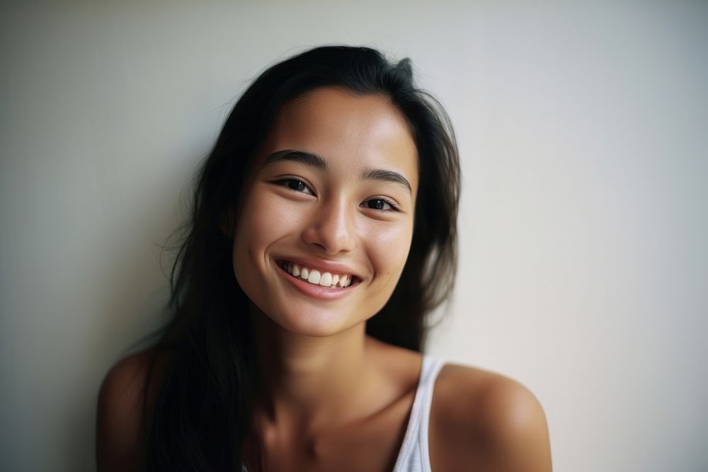 Young south east asian woman portrait smiling adult. AI generated Image by rawpixel.