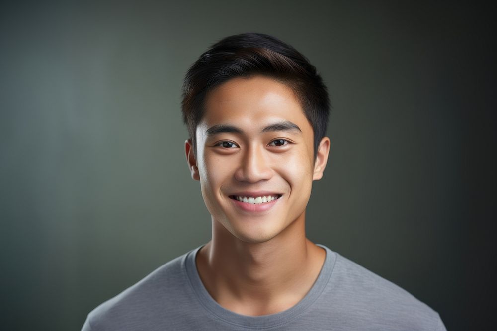 Young south east asian man portrait smiling adult. AI generated Image by rawpixel.