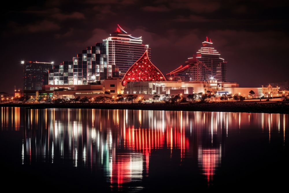 Casino skyline waterfront architecture illuminated. AI generated Image by rawpixel.