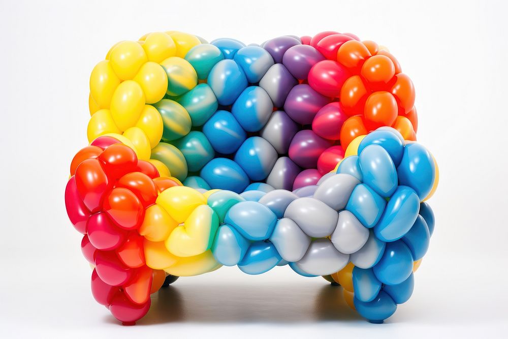 A balloon twisting in the shape of a chair balloon art confectionery creativity. AI generated Image by rawpixel.