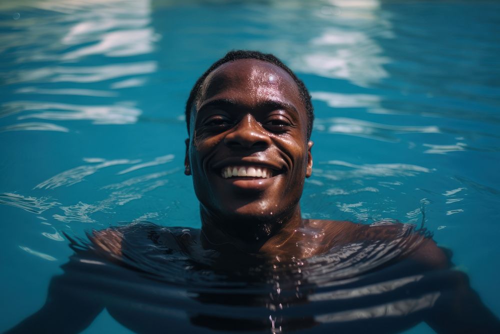 Black man swimming photography portrait. AI generated Image by rawpixel.