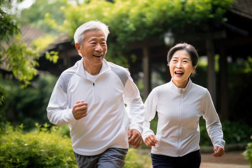 Elderly japanese couple jogging running sports adult. AI generated Image by rawpixel.