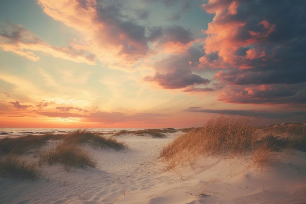 Sunset over dunes landscape outdoors horizon. AI generated Image by rawpixel.