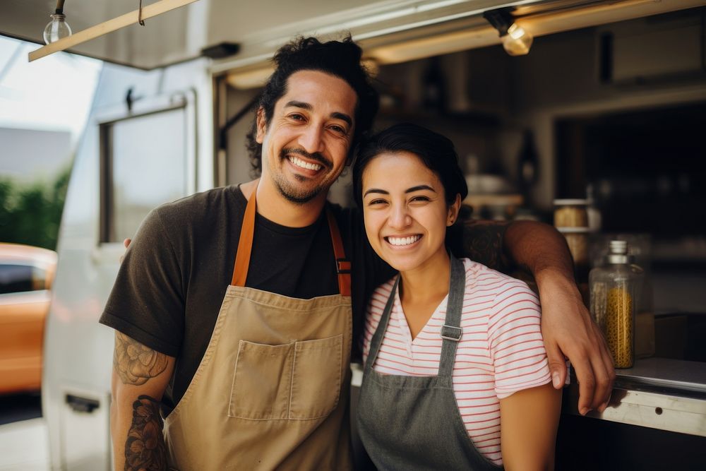 A multiracial couple in front of food truck smiling adult small business. AI generated Image by rawpixel.