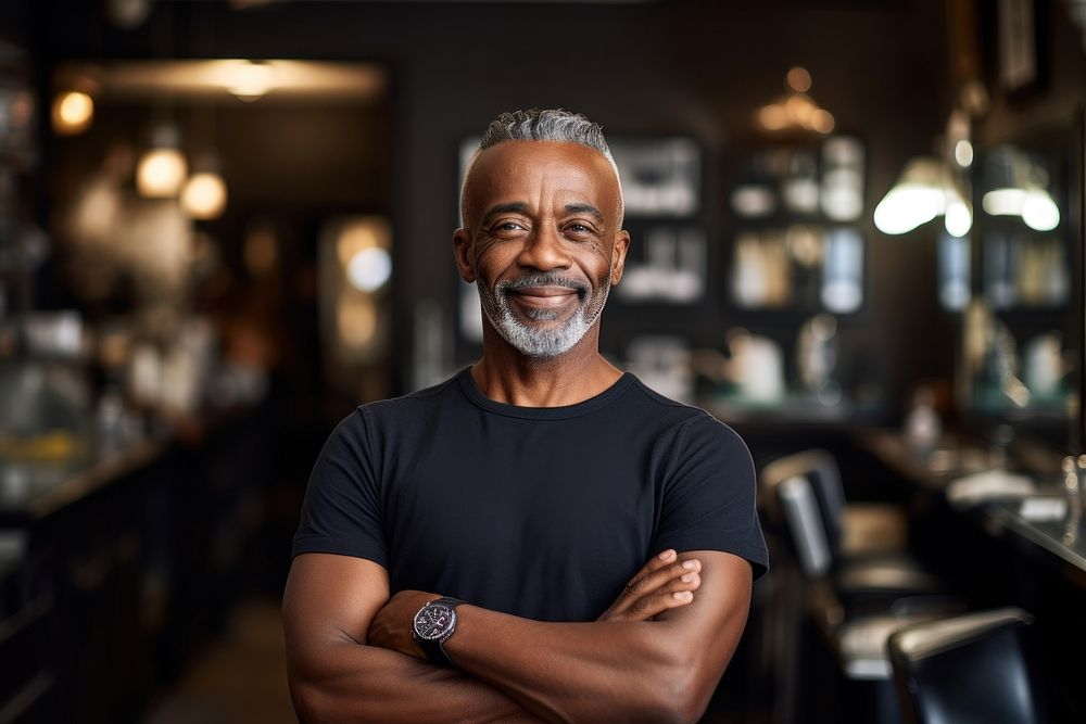 A middle age multiracial owner at barber shop adult happy entrepreneur. AI generated Image by rawpixel.
