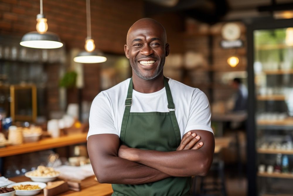 A middle age multiracial man in apron at pizza shop adult entrepreneur restaurant. AI generated Image by rawpixel.