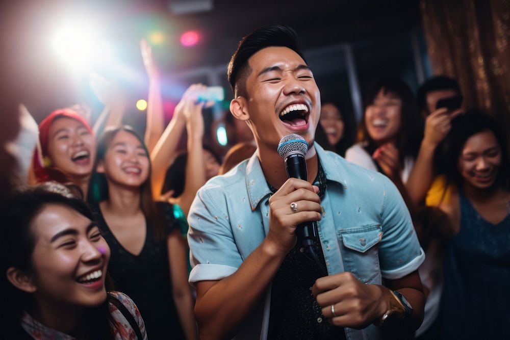 Filipino singing karaoke at house party entertainment microphone adult. AI generated Image by rawpixel.