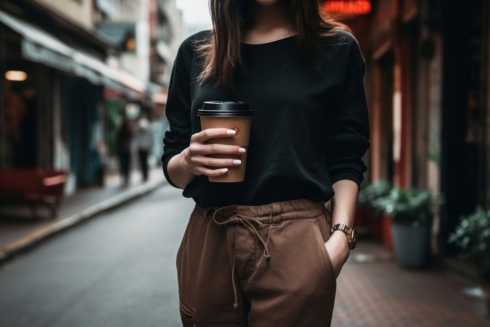 Street style cup holding coffee. AI generated Image by rawpixel.