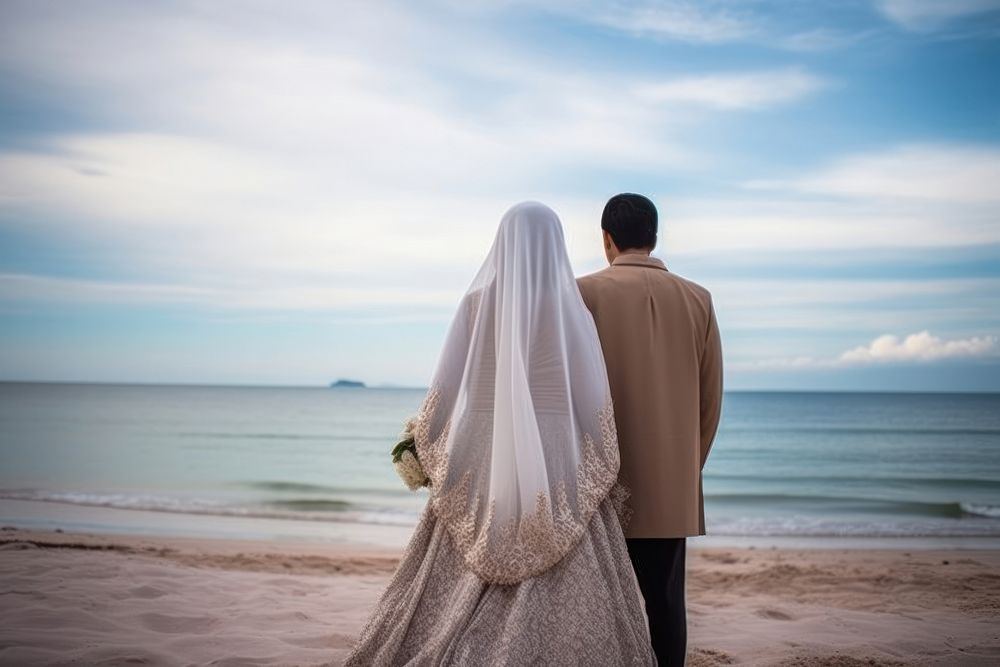 Indonesean Couple wedding at the beach celebration bride adult. AI generated Image by rawpixel.