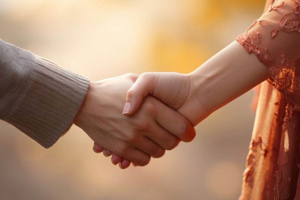 Psychologist hold hands togetherness agreement handshake. AI generated Image by rawpixel.