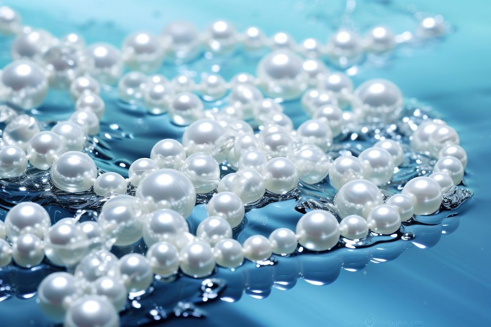 Pearl Necklaces in Water necklace pearl backgrounds. AI generated Image by rawpixel.