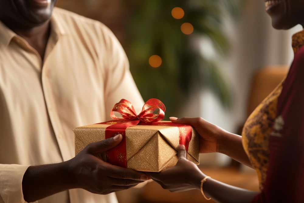 Nigerian man adult gift anticipation. AI generated Image by rawpixel.