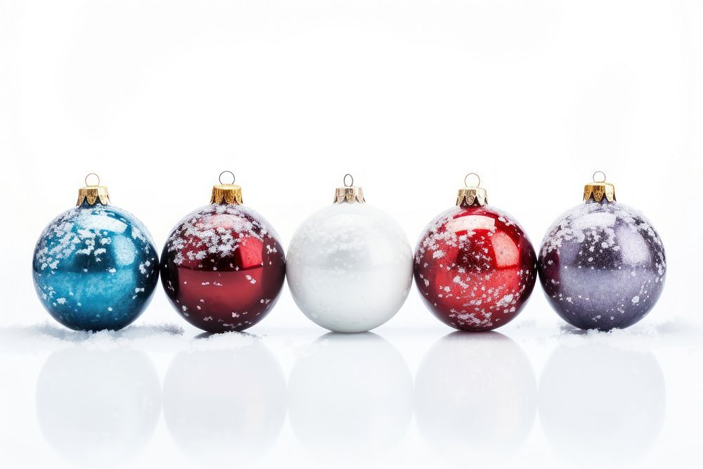 Christmas ornaments in the snow jewelry white background celebration. AI generated Image by rawpixel.