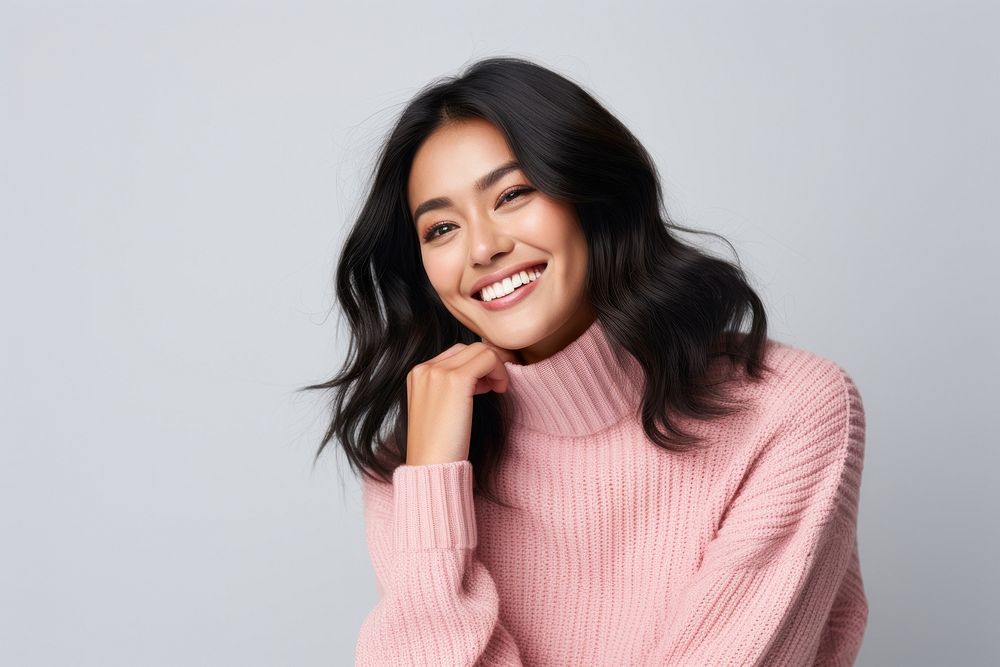 Asian tan woman sweater laughing smiling. AI generated Image by rawpixel.