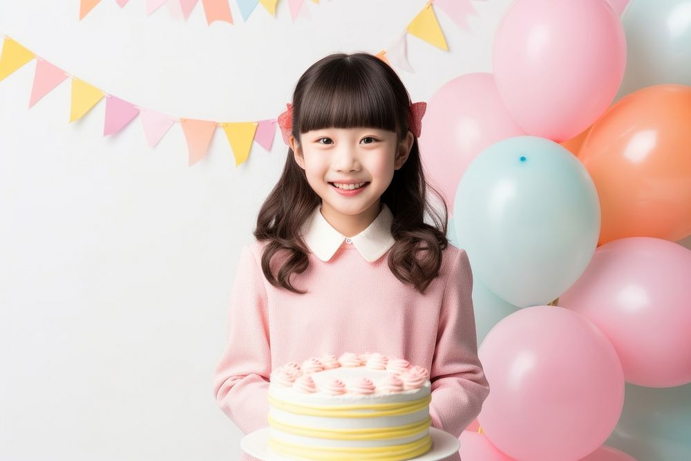Happy girl Japanese birthday party cake dessert balloon. AI generated Image by rawpixel.