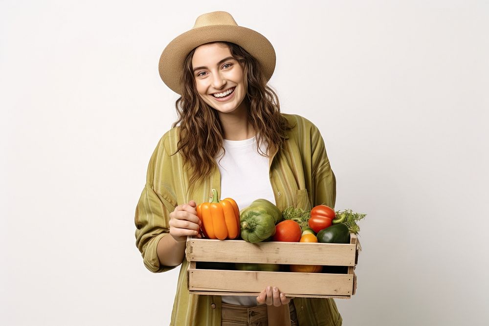 Happy girl wearing gardening box vegetable holding. AI generated Image by rawpixel.