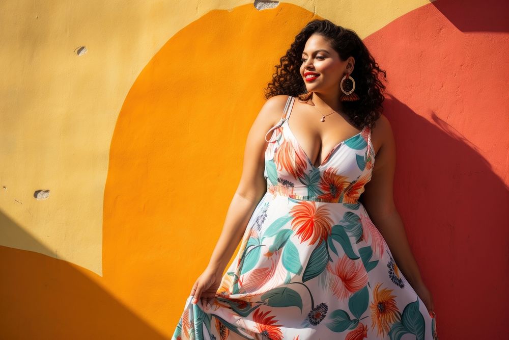 Chubby Latina woman in a sundress standing in front of a colorful wall fashion portrait adult. AI generated Image by…