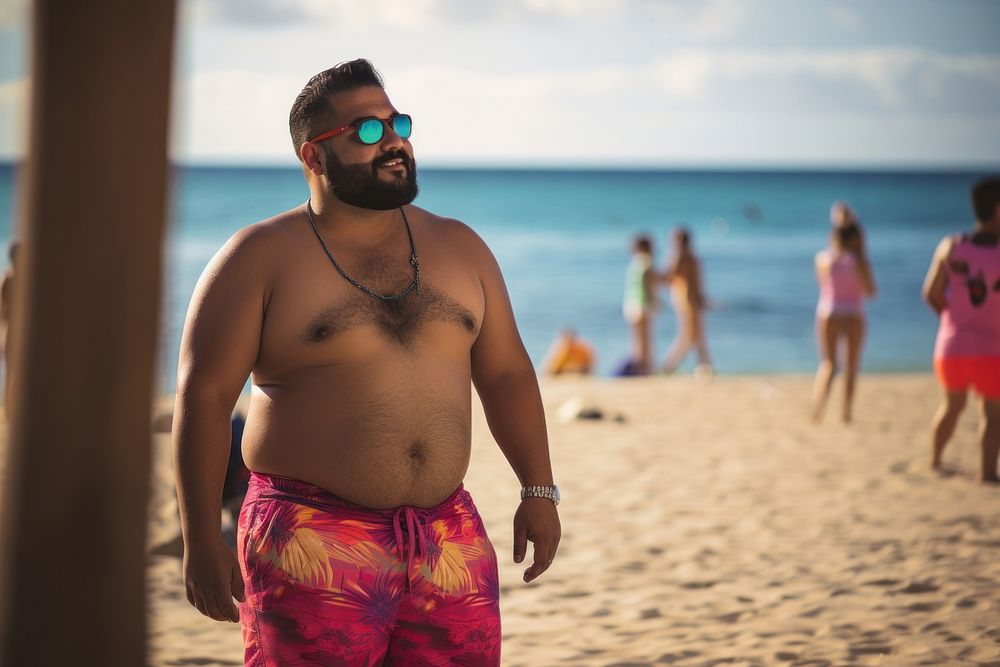 Fat Latino man in a swimming pants and tank top walking on the beach sunglasses vacation portrait. AI generated Image by…