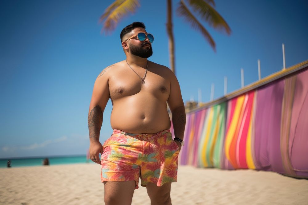 Fat Latino man walking on the beach swimming vacation fashion. AI generated Image by rawpixel.