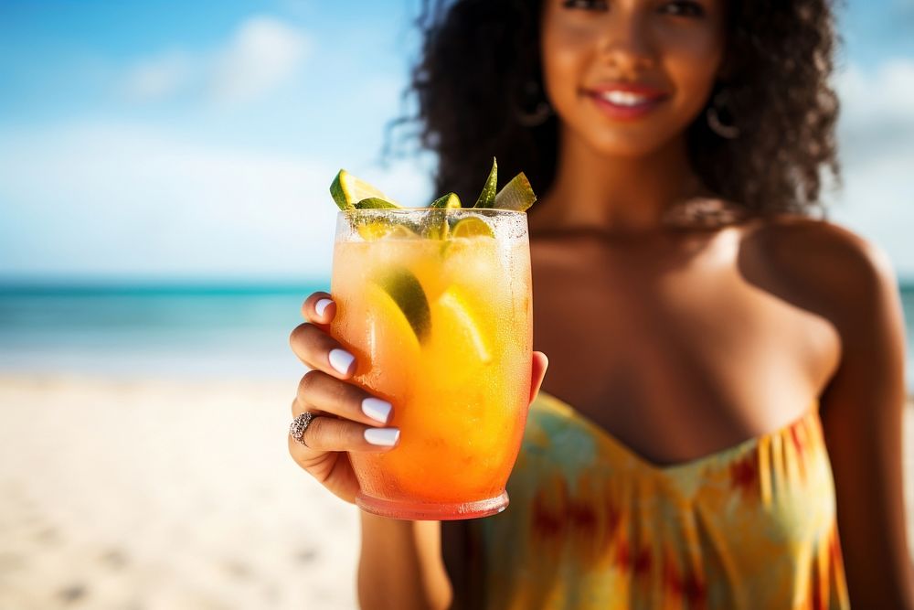 Latina woman holding a tropical drink on a beach relaxation cocktail portrait. AI generated Image by rawpixel.