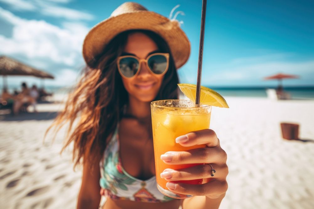 Latina woman holding a tropical drink on a beach vacation relaxation portrait. AI generated Image by rawpixel.