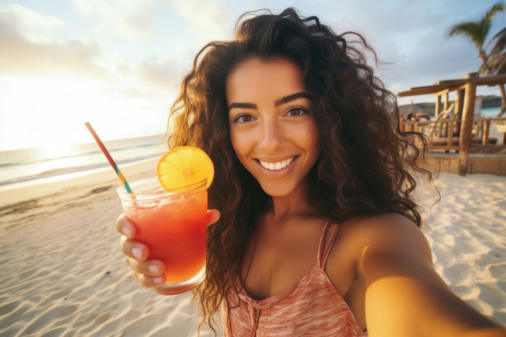 Selfie Latina woman holding a tropical drink on a beach portrait summer relaxation. AI generated Image by rawpixel.