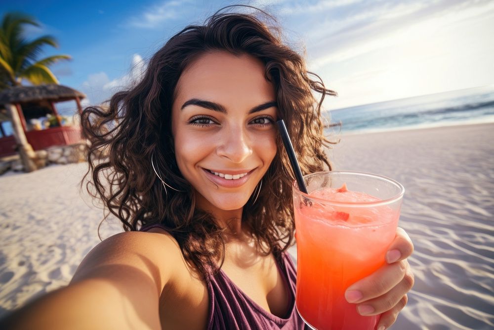 Selfie Latina woman holding a tropical drink on a beach portrait relaxation vacation. AI generated Image by rawpixel.