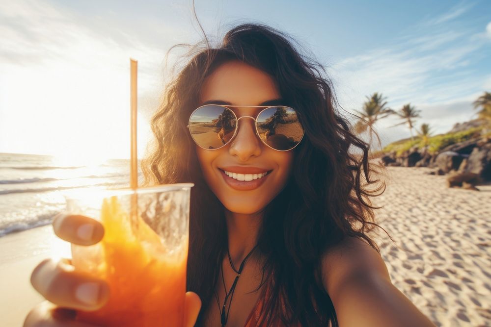 Selfie Latina woman holding a tropical drink on a beach portrait summer selfie. AI generated Image by rawpixel.