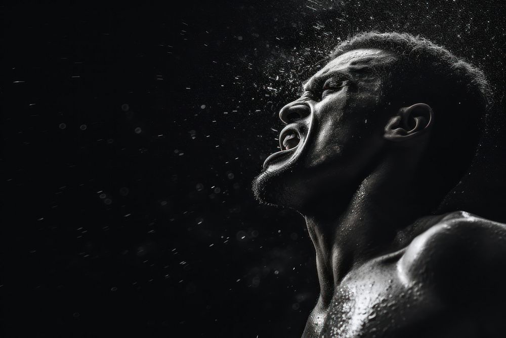 Boxing man punching in the air photography monochrome portrait. AI generated Image by rawpixel.